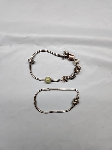 Two pandora bracelets and - pandora,