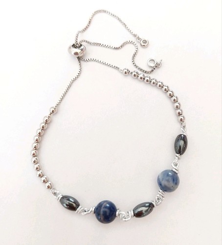 Bracciale cavigliera - , in