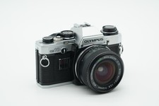 Olympus OM10 fotocamera reflex con obiettivo Soligor 24 mm f/2,8