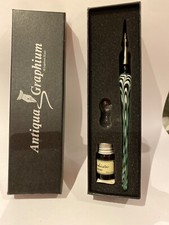 penna in vetro con calamaio e