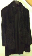 Pelliccia nera, usata poche