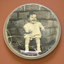 Antico fermacarte fotografico