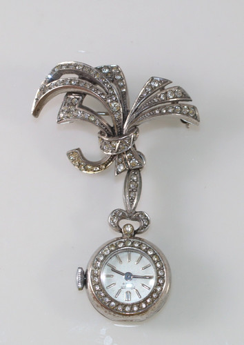 Spilla orologio bavero