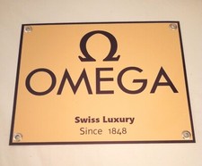 Insegna orologio svizzero