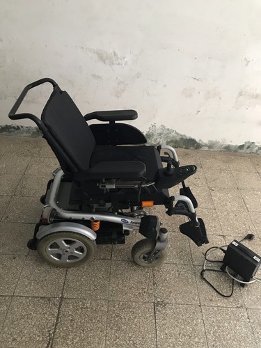 Carrozzina elettrica per - carrozzina,