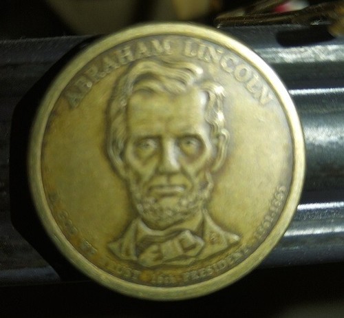 Abraham lincoln moneta - $1,