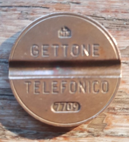 Gettone telefonico 7709 anno - telefonico,