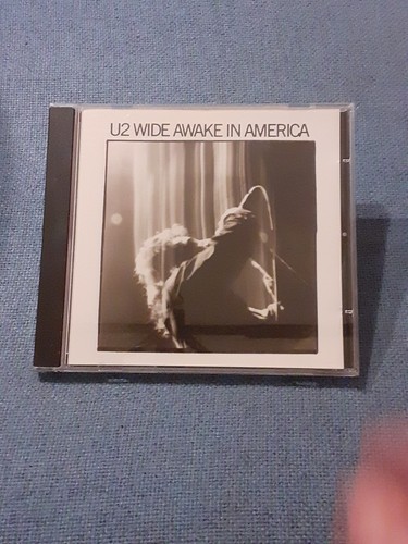 Wide awake america cd - u2, america.