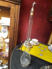 Antica bottiglia vetro decorazione serpente e putto angelo Catenella al tappo...