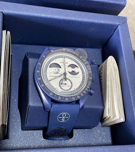 Swatch omega mission - x,