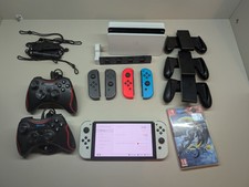 Switch oled + Bayonetta + x4 joycon con prese+ 2 controller usb + carica...