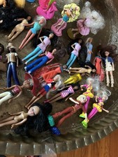 Lotto giocattoli bambola Barbie bambina e altro! 50 in tutto!!