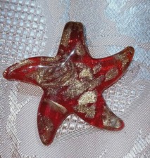 CIONDOLO STELLA ROSSA- VETRO DI MURANO 