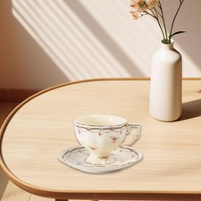 Set di tazze e piattini da