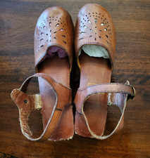 Sandali zoccoli legno pelle