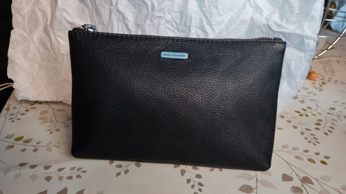 Pochette vera pelle - in,