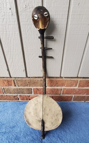 Antico banjo vintage africano