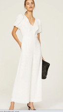 Tuta Club Monaco Texture bianca manica a sbuffo gamba larga scollo a V taglio schiena 12