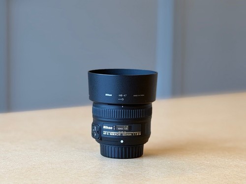 Nikon 50mm 8 g - g, per