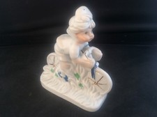 Statuina ciclismo porcellana
