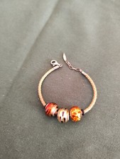 bracciale donna vetro di murano - cuoio- chiusura e finimenti argento 925