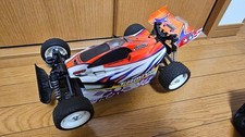 Tamiya Rising Storm 1/10 RC Auto Fuoristrada Elettrico Buggy Arancione Bianco