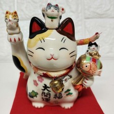Porcellana Maneki Neko