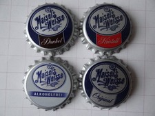 4 vecchi tappi a corona