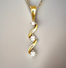 Ciondolo trilogia diamanti oro