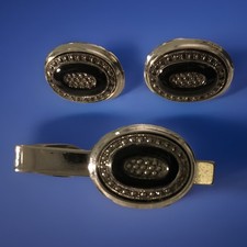 Set fermacravatte e bracciale