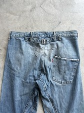 Fibbia jeans intrecciata