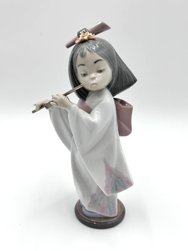 Lladro 6150 playing the flute - playing,