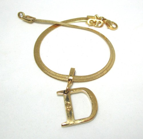 Christian dior gold plate - christian,