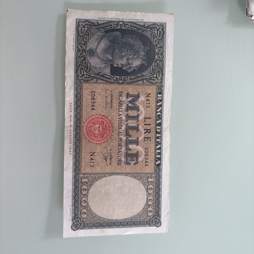 Mille lire ornata - di, perle
