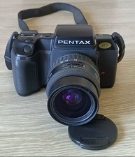 PENTAX  SF7 + ZOOM 28/80.  Funzionante. Very Good condition working.