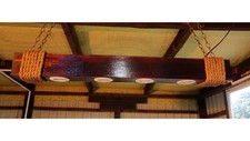 Lampadario in legno su catene
