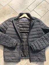 Piumino Woolrich Uomo, Taglia