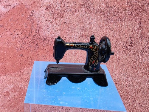 Carino miniatura metallo