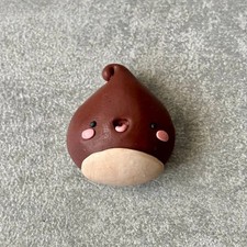 Calamita castagna con faccina