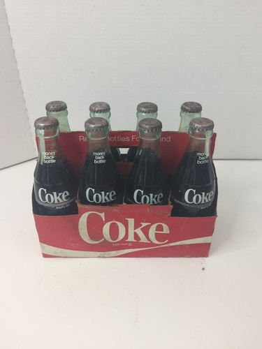 Filled coke bottles - filled, w/