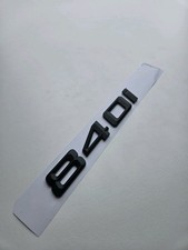 840i emblema nero opaco