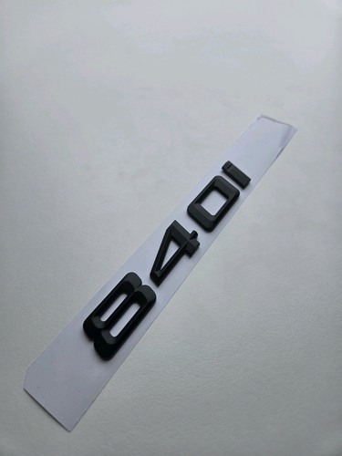 840i emblema nero opaco