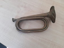 trombetta antica strumento musicale. probabilmente in rame.