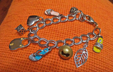 BRACCIALE VINTAGE CON 9 CHARMS (di cui 3 sandaletti)