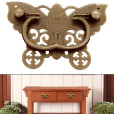 Maniglia a forma di farfalla