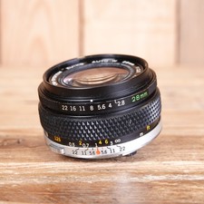 Obiettivo Olympus OM-System Zuiko Auto-W 28 mm f2.8 - adesivo fungo e apertura