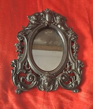 Scultura Antica.Porta immagini in legno di Ebano nero; tutto a rilievo; cm 20x25