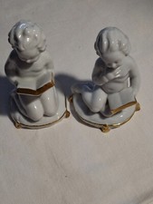 Putti lettori  in porcellana