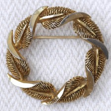 Spilla corona di alloro tono