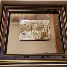 Quadro con specchio e rilievo